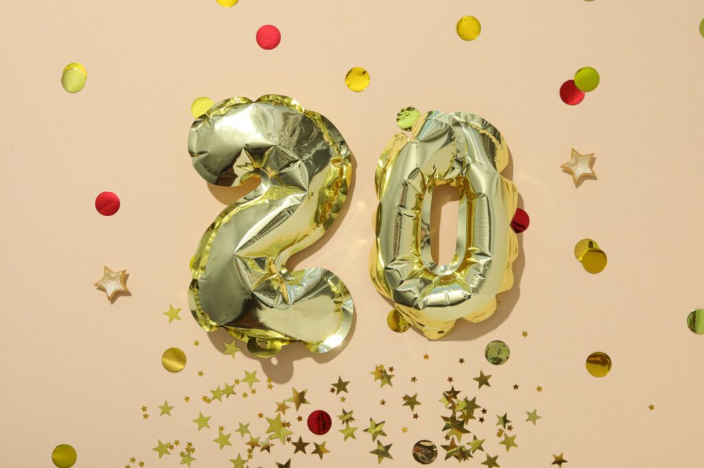 Festive number 20 made of golden balloons