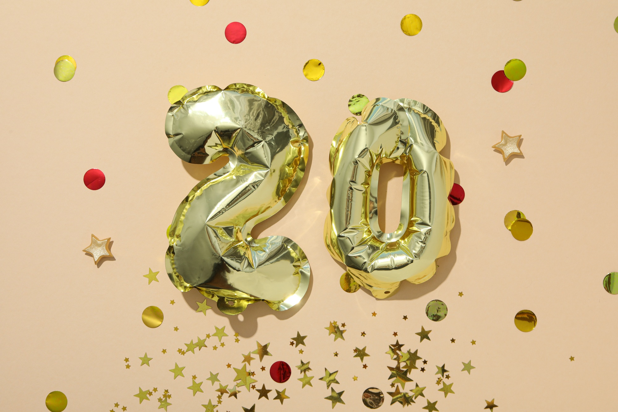 Festive number 20 made of golden balloons